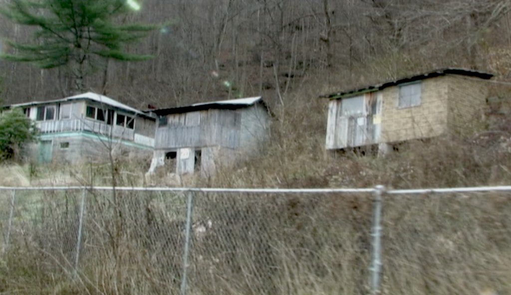 Properties managed by the National Park Service. After years of neglect, the homes are rotting along the Scenic Byway, New River, West Virginia.